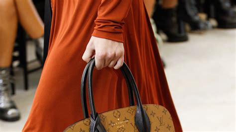 Louis Vuitton Joins Alibaba Alliance .